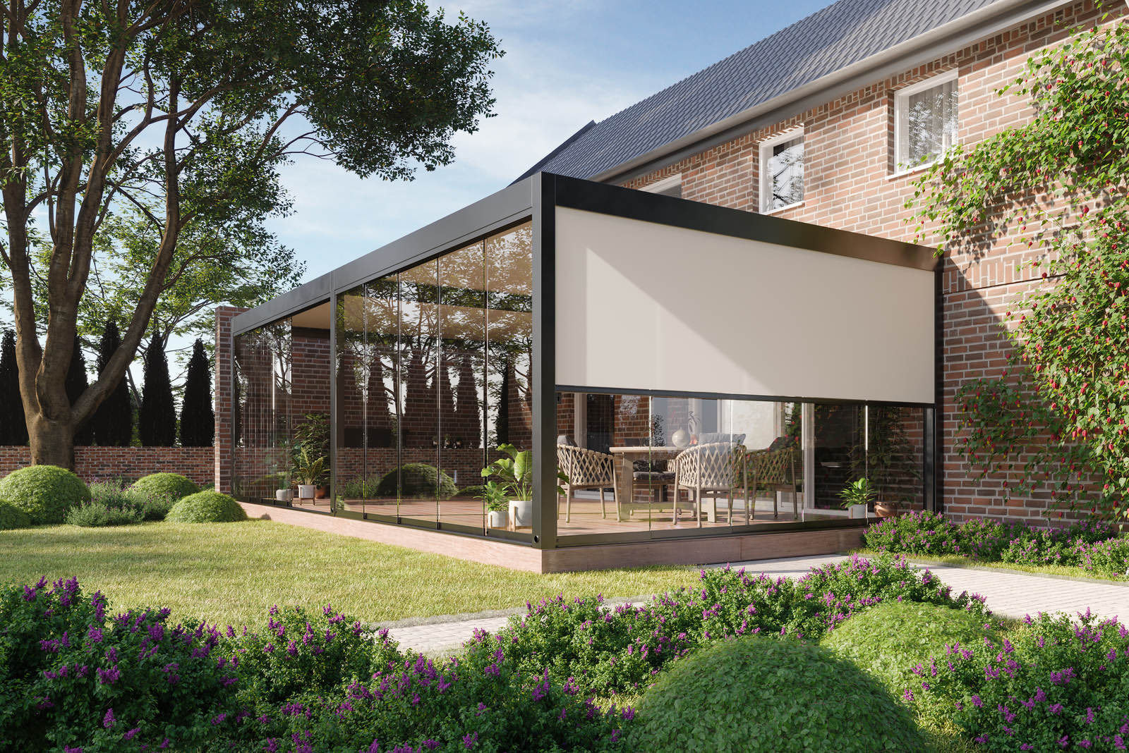 Glazed bioclimatic pergola attached to a brick house, with outdoor dining furniture inside